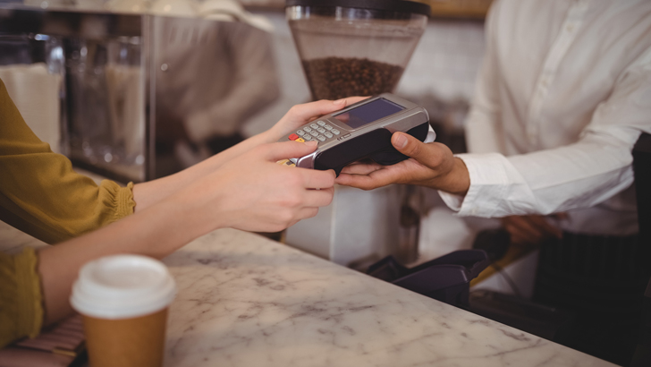 Carly cut back on fancy coffees in order to pay down debt.