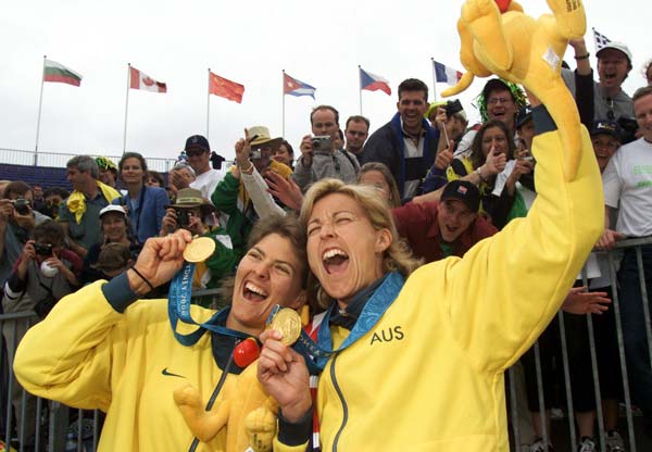 Natalie Cook and Kerri Pottharst celebrate after their gold medal win over Brazil in the final of the women's beach volleyball at the Sydney 2000 Olympic Games. Photo: Hamish Blair/ALLSPORT.