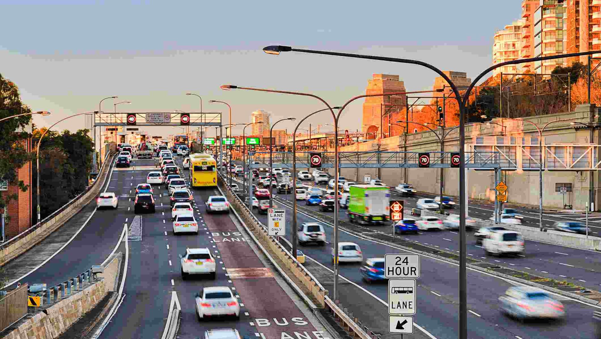 Cars driving over the Sydney Harbour Bridge as they head to holiday rentals.