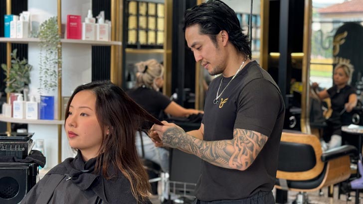 rich tran with a client in his ultrafade by rich salon