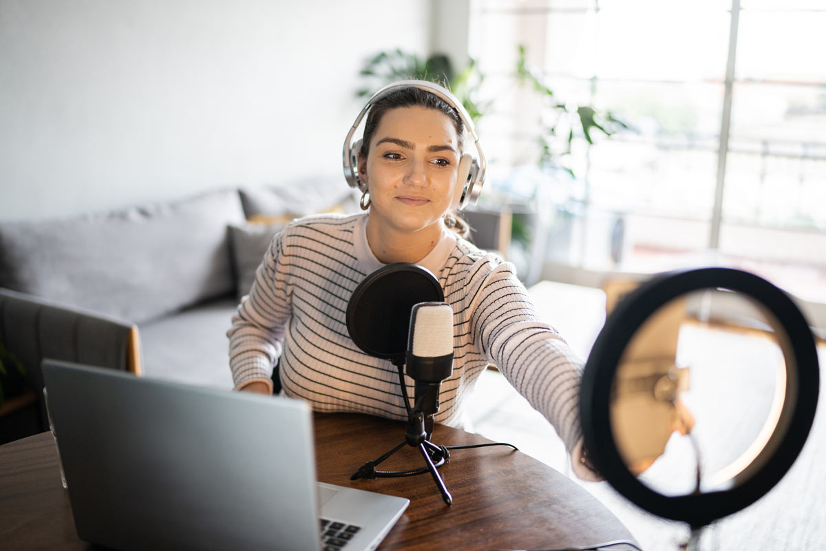 Finance influencer recording social media investing content